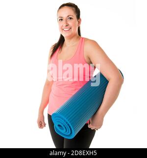 Une femme sympa et gaie avec un instructeur de fitness Banque D'Images