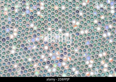 Fond en mosaïque de boules de verre rondes dans le mur Banque D'Images