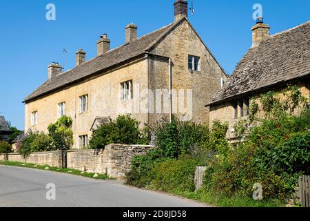 Maisons en pierre de Cotswold dans le village de Guitting Power, Gloucestershire Banque D'Images