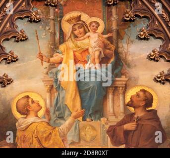 VIENNE, AUSTIRA - 22 OCTOBRE 2020: Le détail de la peinture de Madonna avec le S. Laurence et Saint François d'Assise dans l'église Laurentiuskirche. Banque D'Images