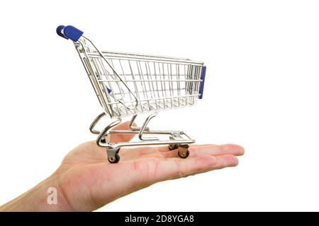 Main avec un panier Banque D'Images