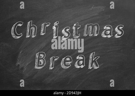 Texte de dessin à la main Christmas Break sur tableau noir Banque D'Images