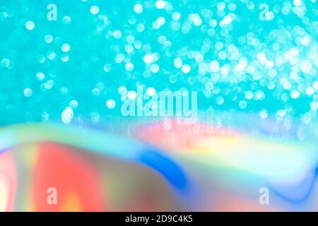 Abstrait mixte holographique bleu ai aqua flou scintillant fond brillant. Film arc-en-ciel au néon liquide style licorne. Style bokeh brillant. Festiv Banque D'Images