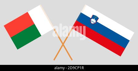 Drapeaux croisés de Madagascar et de Slovénie. Couleurs officielles. Proportion correcte. Illustration vectorielle Illustration de Vecteur