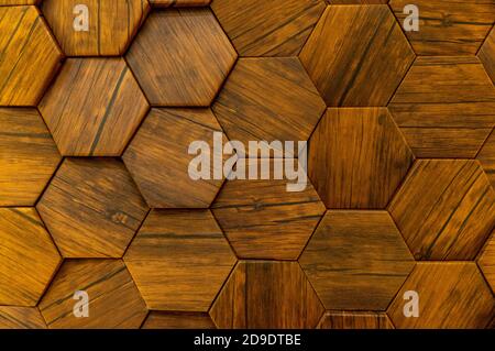 Fond de motif en bois hexagonal. Ancienne texture en bois en nid d'abeille de tuiles, composé d'un ensemble de plaques hexagonales Banque D'Images