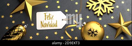 Noël - étiquette cadeau avec le message de Joyeux Noël espagnol 'Feliz Navidad' sur fond noir de pierre de couleur or décorations de noël autour Banque D'Images