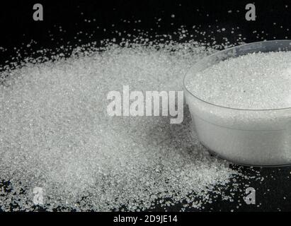 Acide citrique ou poudre d'acide citronné depuis la vue de dessus Banque D'Images