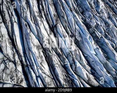 Vue aérienne du glacier d'en haut, glace et cendres du volcan texture paysage, belle nature glace arrière-plan de l'Islande Banque D'Images