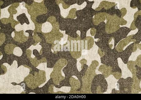 Arrière-plan militaire vintage. Tissu avec motif camouflage rétro vert. Banque D'Images