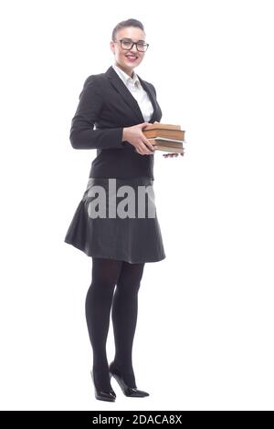 en pleine croissance. une femme d'affaires souriante avec une pile de livres Banque D'Images