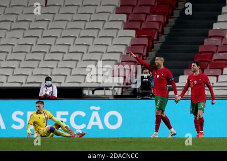 Lisbonne, Portugal. 11 novembre 2020. Cristiano Ronaldo du Portugal (C ) célèbre après avoir obtenu son score lors du match de football amical entre le Portugal et Andorre, au stade Luz à Lisbonne, au Portugal, le 11 novembre 2020. Crédit : Pedro Fiuza/ZUMA Wire/Alay Live News Banque D'Images