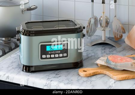 Machine sous vide sur la table de cuisine. Rendu 3D Banque D'Images