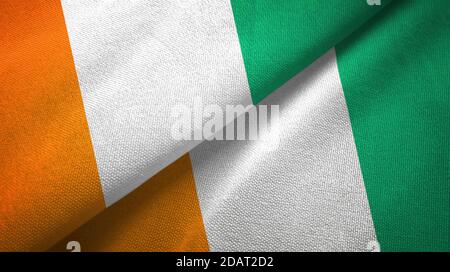 Côte d'Ivoire Côte d'Ivoire deux drapeaux texture textile Banque D'Images