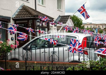 Terrasse de maison unioniste décorée de drapeaux Union Jack. Belfast, Irlande du Nord, Royaume-Uni, Royaume-Uni, Europe Banque D'Images