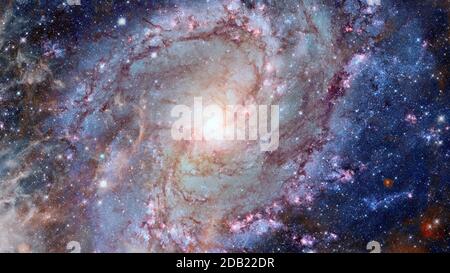 Disque spirale géante d'étoiles, de poussières et de gaz. Éléments de cette image fournie par la NASA Banque D'Images