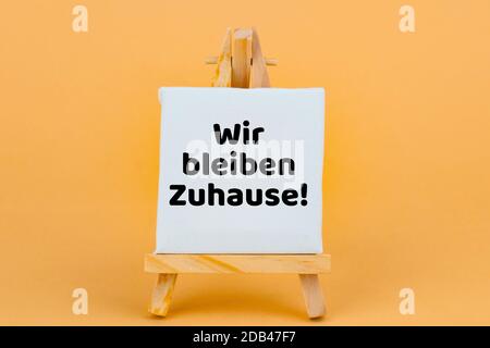 Concept: Crise de Corona - langue allemande - Wir blieben Zuhauser - nous avons séjourné à la maison et rester en sécurité Banque D'Images