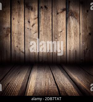 Arrière-plan de planches en bois rugueuses adjacentes au mur Banque D'Images