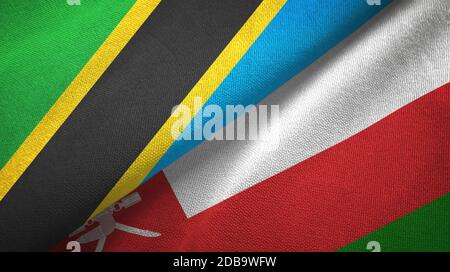 Tanzanie et Oman deux drapeaux tissu textile, texture de tissu Banque D'Images