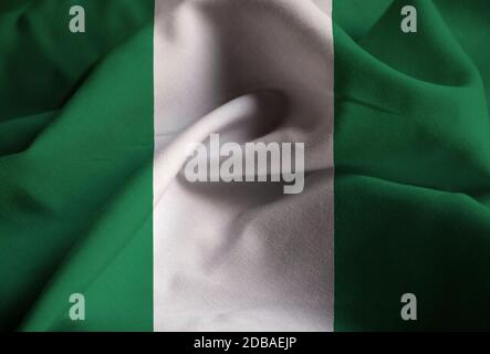Gros plan sur le drapeau du Nigeria à volant, drapeau du Nigeria soufflant dans le vent Banque D'Images