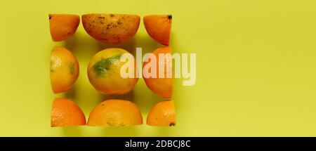 Orange fruit sur fond de papier coloré Banque D'Images