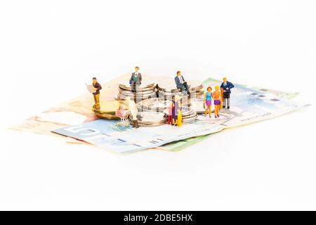 Éducation du Canada avec des personnes miniatures sur fond blanc Banque D'Images