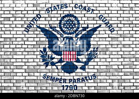 Pavillon de l'United States Coast Guard peint sur mur de brique Banque D'Images