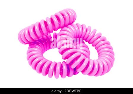 Outils de soin de cheveux isolés. Close-up d'un élastique de couleur crème ou spirale scrunchy bande de cheveux pour les femmes la coiffure isolé sur un fond blanc. Tools Banque D'Images