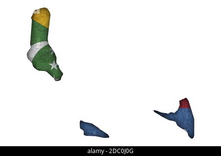 Carte et drapeau des Comores sur le béton abîmé Banque D'Images