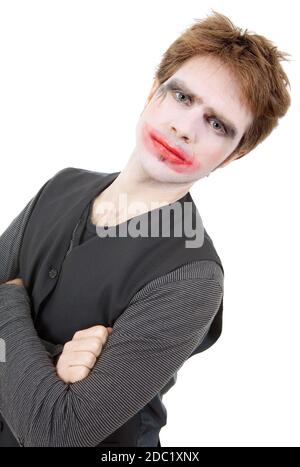 Jeune homme habillé comme joker, isolated on white Banque D'Images