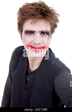 Jeune homme habillé comme joker, isolated on white Banque D'Images