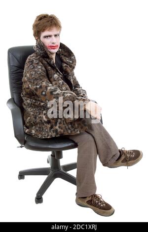 Jeune homme habillé comme joker, isolated on white Banque D'Images