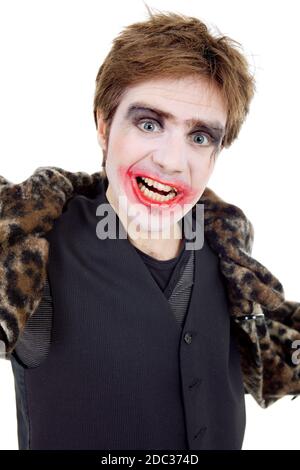 Jeune homme habillé comme joker, isolated on white Banque D'Images