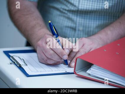 consigner et prendre des notes dans l'administration et le travail de bureau Banque D'Images