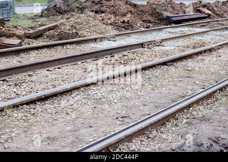 Poncer les travaux de réparation sur les rails de tram de près Banque D'Images