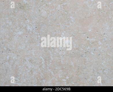 Onyx rose pâle, gros plan d'une surface plane en pierre naturelle polie. Arrière-plan, texture. Banque D'Images