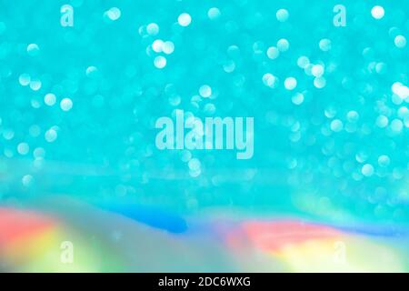 Abstrait mixte holographique bleu ai aqua flou scintillant fond brillant. Film arc-en-ciel au néon liquide style licorne. Style bokeh brillant. Festiv Banque D'Images
