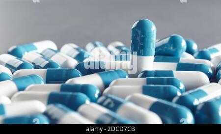 Close up photo de bleu et blanc capsules, selective focus. Banque D'Images