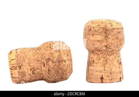 Deux bouchons de champagne sur fond blanc. Un bouchon à champagne à l'horizontale. Banque D'Images