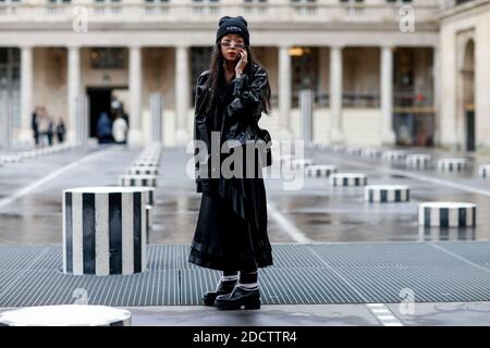 Street style, Christina Paik arriving at Louis Vuitton Fall-Winter