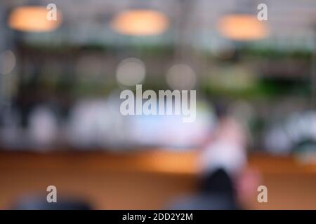 Arrière-plan flou dans le café-restaurant café-restaurant Blur or Flou artistique en arrière-plan avec bokeh Banque D'Images