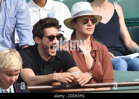 L'acteur Pierre Niney et sa petite amie Natasha Andrews assistent à la finale masculine de l'Open de France 2018 à Roland Garros le 10 juin 2018 à Paris, France. Photo de Laurent Zabulon/ABACAPRESS.COM Banque D'Images