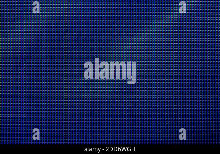 Pixels dans l'échelle macro de l'écran à cristaux liquides. Arrière-plan de la texture de l'écran mural vidéo. Bleu avec quelques dégradés diagonaux Banque D'Images