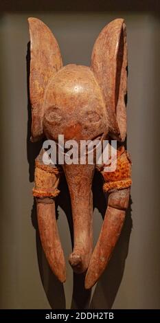 Santa Cruz de Tenerife, Spain; March 22 2019: Antique african Bamileke elefant  wooden mask, from Cameroon,  on grey wall surface Stock Photo