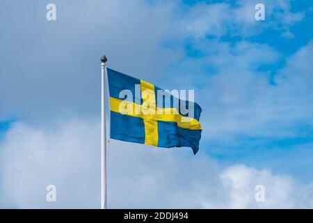Drapeau de la Suède agitant dans la brise. Banque D'Images