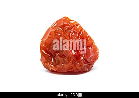 Faire pourrir la tomate cerise rouge sur fond de merote. Studio photo d'un légume Banque D'Images