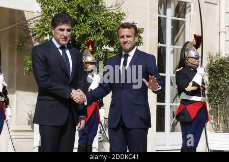 Le président français Emmanuel Macron accueille Netchirvan Barzani, Président du gouvernement régional du Kurdistan d'Irak, qui arrive au Palais de l'Elysée, Paris, France, le 10 juillet 2019. Photo de Henri Szwarc/ABACAPRESS.COM Banque D'Images