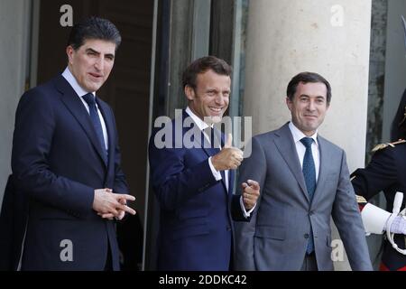 Le président français Emmanuel Macron accueille Netchirvan Barzani, Président du gouvernement régional du Kurdistan d'Irak, qui arrive au Palais de l'Elysée, Paris, France, le 10 juillet 2019. Photo de Henri Szwarc/ABACAPRESS.COM Banque D'Images
