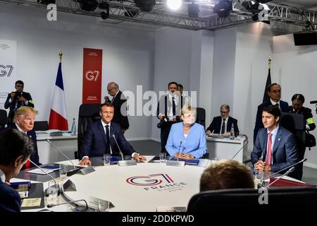 LE président AMÉRICAIN Donald Trump, son homologue français Emmanuel Macron, la chancelière allemande Angela Merkel et le premier ministre canadien Justin Trudeau assistent à une séance de travail sur la politique étrangère et les affaires de sécurité le dernier jour du sommet du G7 à Biarritz, en France, le 26 août 2019. Photo de Nicolas Mollo/Pool/ABACAPRESS.COM Banque D'Images