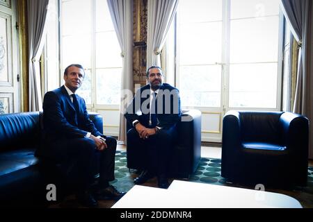 Le président français Emmanuel Macron s'entretient avec le Premier ministre libanais Saad Hariri avant leur rencontre au Palais de l'Elysée à Paris, en France, du 20 au 22 septembre 2019. Photo de Hamilton/Pool/ABACAPRESS.COM Banque D'Images