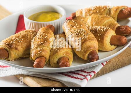 Chiens de Crescent. Croissants pour chiens chauds. Banque D'Images